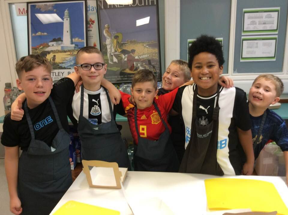 A group of boys at a Bostey cookery session