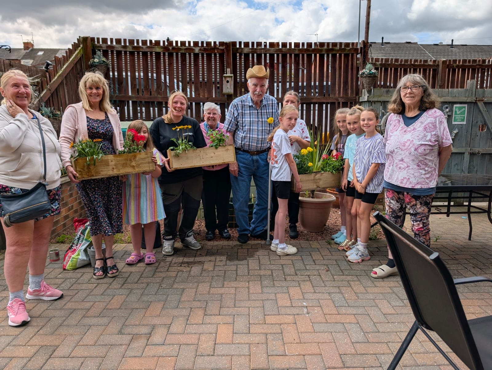 Children planting and gardening outdoors
