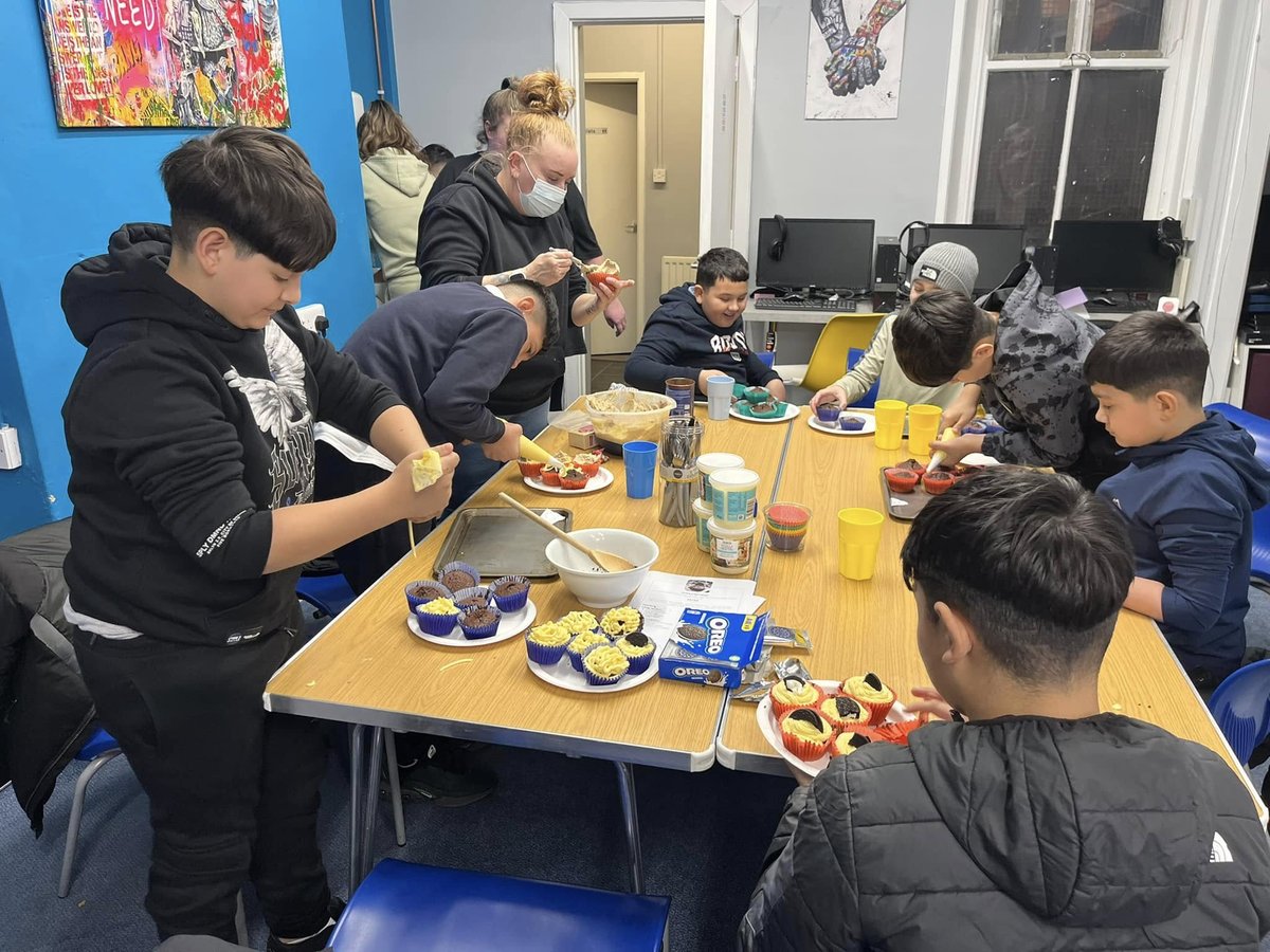Young people preparing food together at a North Benwell Saturday session